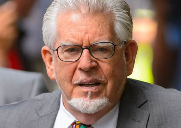 Rolf Harris is charged with seven more counts of indecent assault against girls as young as 12.