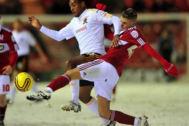 Middlesbrough's Joseph Bennett and Hull City's Jay Simpson (left) in action back in November 2010, the match ending in a 2-2 draw.