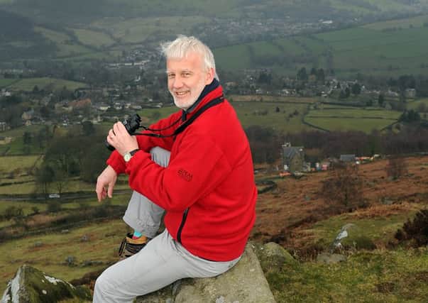 Rhodri Thomas, an ecologist with the national park authority, on Curbar Edge . (Picture Scott Merrylees).