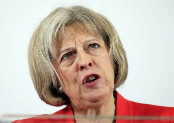 Home Secretary Theresa May backs the advent of crime commissioners.
