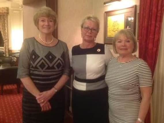 Vicki Wimpenny, Huddersfield GC's lady vice captain, left, Liz Roberts, new lady captain, centre, and Jean Gee, outgoing lady captain.