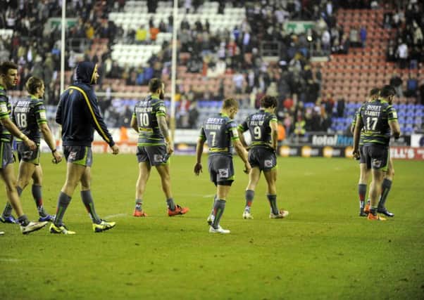 Leeds Rhinos' players leave the pitch after losing 28-6 at Wigan Warriors last week. Like all of Yorkshire's Super League clubs, they are looking for a positive Easter period.  Picture: Bruce Rollinson.