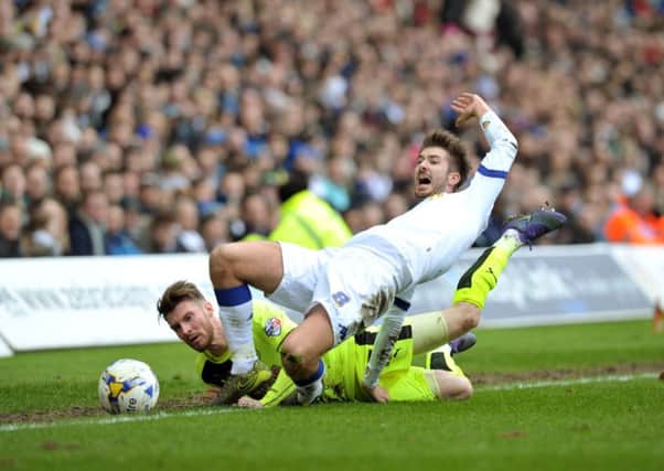 Leeds's Luke Murphy is fouled by Town's James Husband.  Picture Tony Johnson