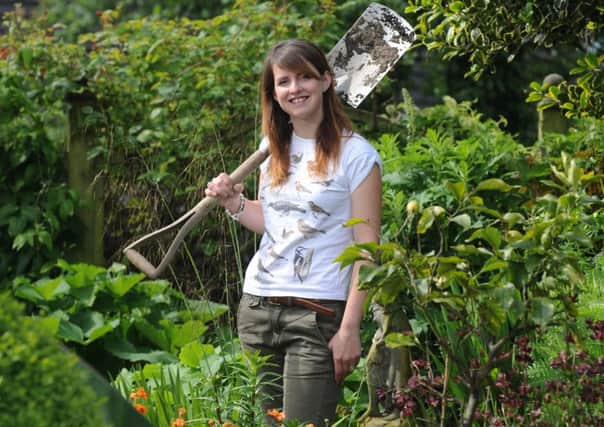 The Queen of Spades and new TV garden presenter Katie Rushworth from Bingley.