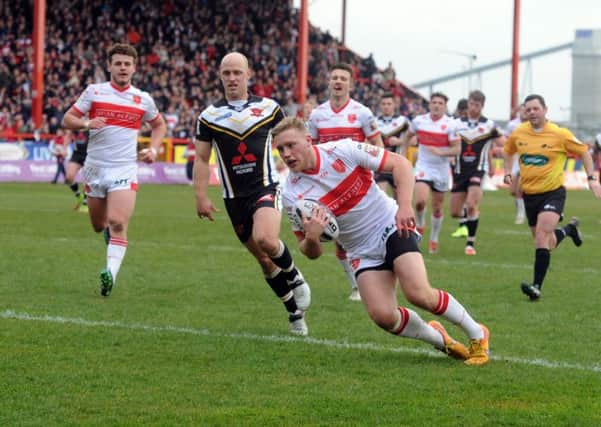 Hull KR's James Greenwood goes over to score the fifth, first-half try against Salford.  Picture: Tony Johnson.