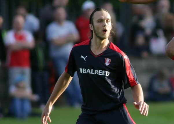 Tom Thorpe in action for Rotherham