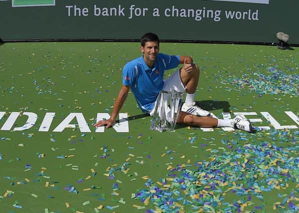 Novak Djokovic celebrates his win at Indian Wells.