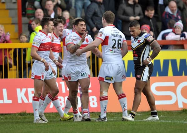 Rovers celebrate Ken Sio's first-half try as they finally got the monkey off their backs against Salford. (Picture: Tony Johnson)