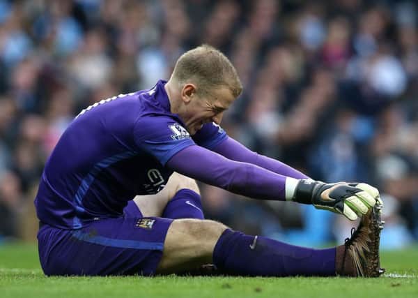 Manchester City goalkeeper Joe Hart was injured in the 1-0 derby defeat to Manchester United (Picture: Martin Rickett/PA Wire).