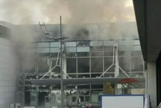 Video grab taken from Sky News of the scene at Brussels Airport, Belgium, where two explosions have been heard.