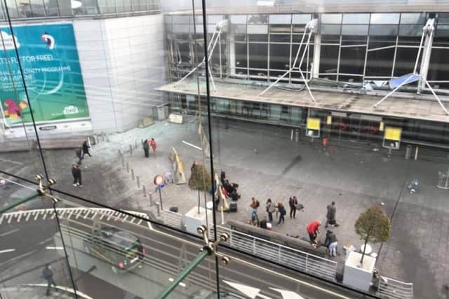 Picture taken with permission from the Facebook site of Jef Versele showing the aftermath of this morning's explosions at Brussels airport.
