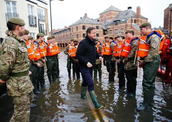 David Cameron waded straight into controversy when he visited flood-hit York on December 28.