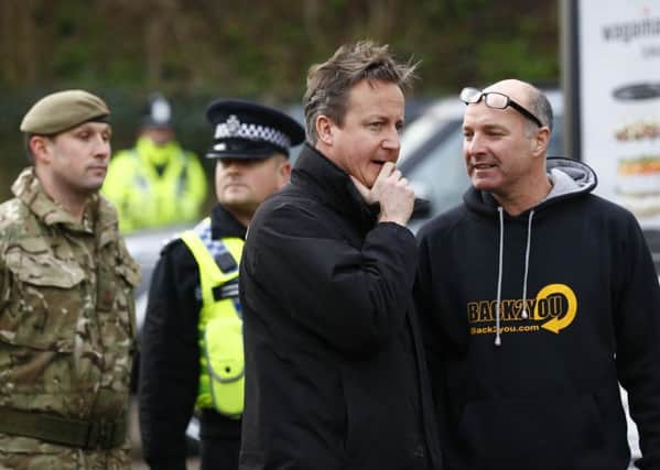 David Cameron during his visit to York in the wake of the floods last December. PA.