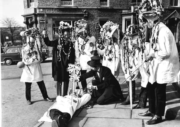 28th March 1970

Players of Brighouse Children's Theatre give their 'Pace Egg' performance in Mirfield town centre.