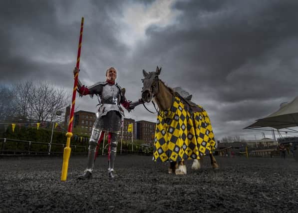 The twentieth anniversary Easter Jousting Tournament at the Royal Armouries, Leeds. Pictured Andy Deane, holding Jasmine, from the Royal Armouries who will be representing England during the weekends contest.