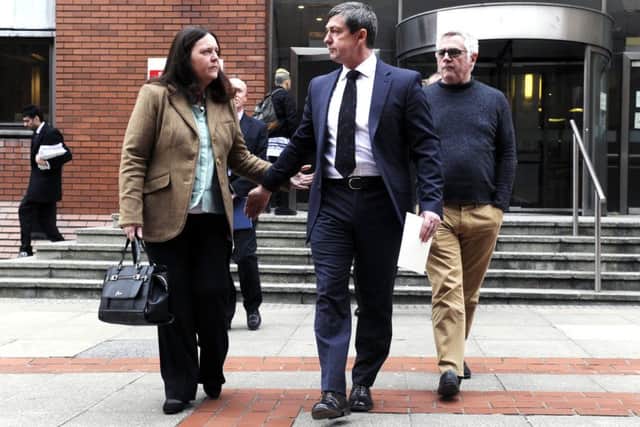 Major Richard Gilbey,  James' mother Angela and uncle Clive leave Leeds Crown Court