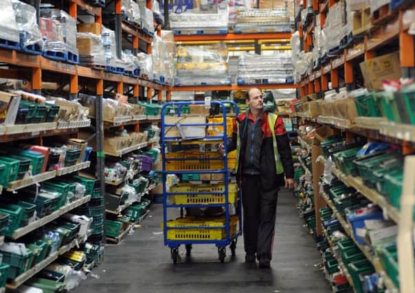 Order picker Neil Hodgkinson in the Approved Food's warehouse in Sheffield. Picture Scott Merrylees