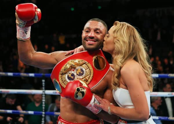 Kell Brook celebrates victory over Kevin Bizier with partner Lindsey Myers after his IBF World Welterweight Championship bout at Sheffield Arena (Picture: Nick Potts/PA Wire).