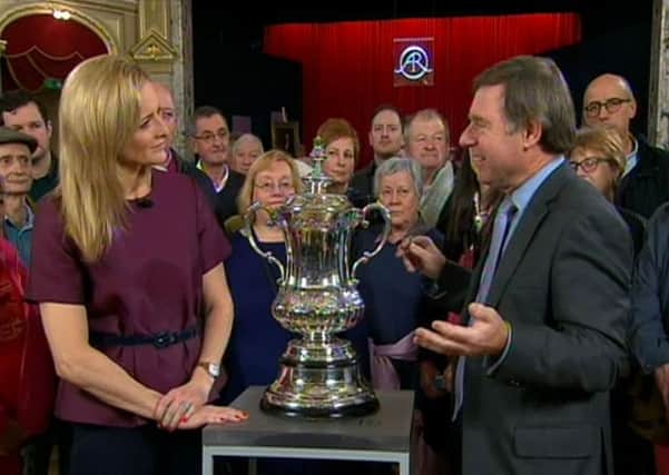 Video grab taken from BBC One's Antiques Roadshow of BBC Sport's Gabby Logan and Antiques Roadshow expert Alastair Dickenson