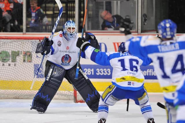 Coventry goalie Brian Stewart, left, celebrates his team's play-off win over Sheffield Steelers. Picture: Dean Woolley.