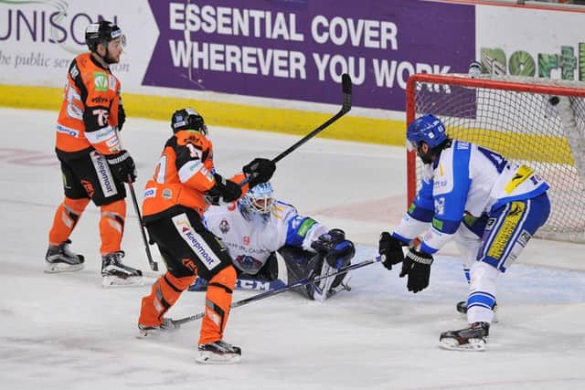 Freddie Vestberg (No 10) fires the puck over Brian Stewart's goal from two yards out. Picture: Dean Woolley.