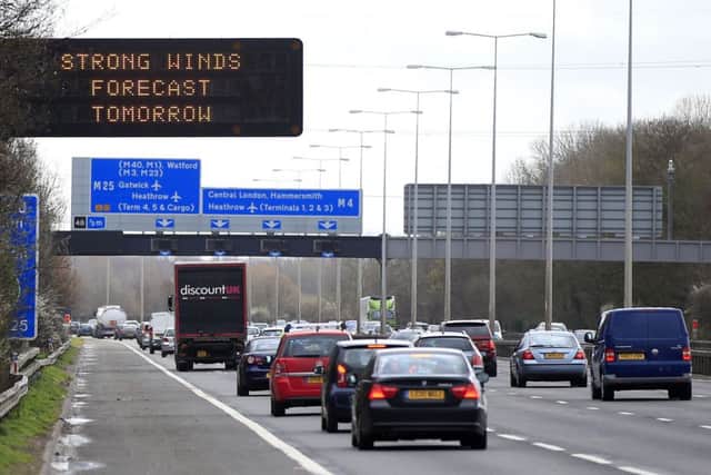 A matrix sign warns motorists on the M4 motorway about high winds expected on Easter Monday