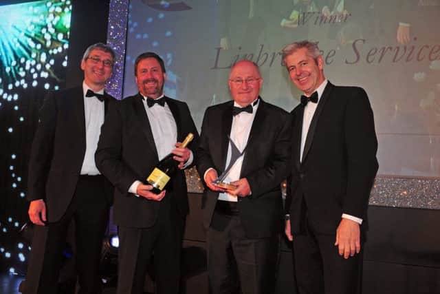 14 October 2015.......  Paul Bailey and Gary Scott of Linbrooke Services receive the companies with a Â£10m-50m turnover award from Gordon Singer of PWC, left and Justin Webb at the Yorkshire Post Excellence in Business awards at The Queens Hotel  in Leeds. Picture Tony Johnson