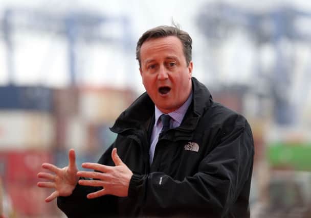 Prime Minister David Cameron speaks to workers during a visit to Felixstowe Port in Suffolk Photo: Chris Radburn/PA Wire