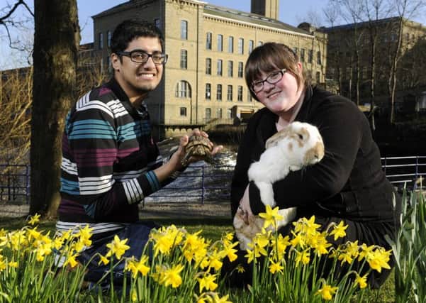 Askham Bryan College's animal management students are moving to a new base in Saltaire. Pictured: Animal management student Taqi Amini and lecturer Jess Brian with Trevor the tortoise and Brutus the rabbit.