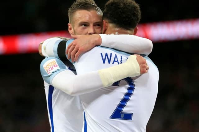 England's Jamie Vardy (left) celebrates scoring his side's first goal of the game with team-mate and fellow Sheffielder Kyle Walker (right). (Picture: Mike Egerton/PA Wire)