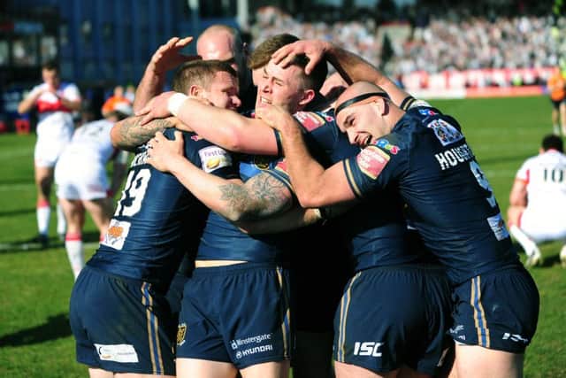 GREAT TIMING: Hull FC's players celebrate Steve Michaels' match-winning try. Picture: Jonathan Gawthorpe.