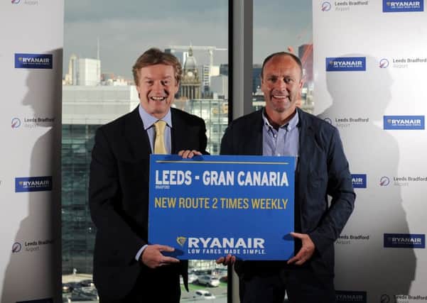 checking in: Tony Hallwood, left, aviation development director at Leeds Bradford Airport, with Kenny Jacobs at the launch of Ryanairs new route from the airport. Picture: simon hulme