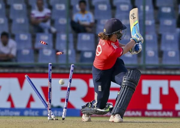 England's Natalie Sciver is bowled as she bats during the Twenty20 semi-final in Delhi on Wednesday against Australia, who won by five runs. Picture: AP/Manish Swarup