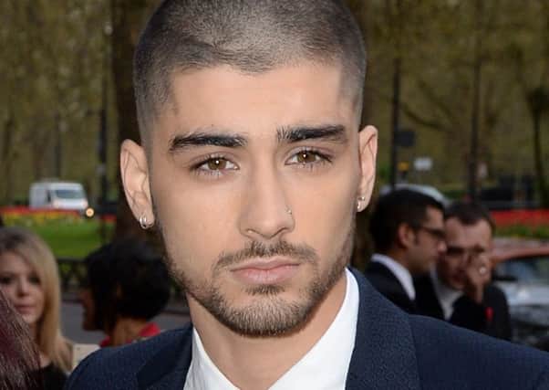 Zayn Malik has beaten Adele to claim the number one spot in this week's album chart.