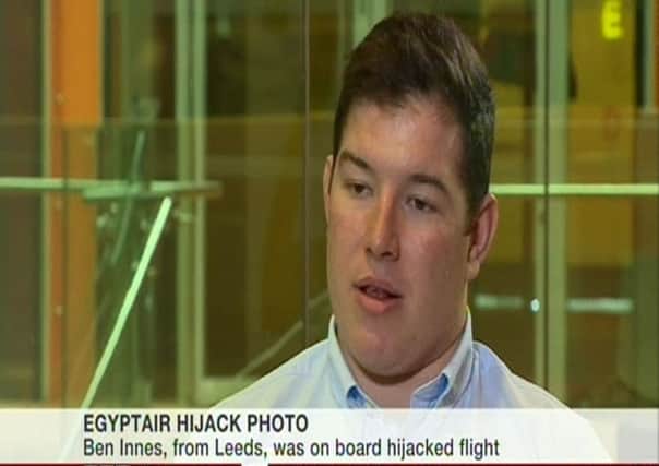 Video grab taken from BBC News of Ben Innes who had a picture taken with the alleged hijacker of an Egyptair jet