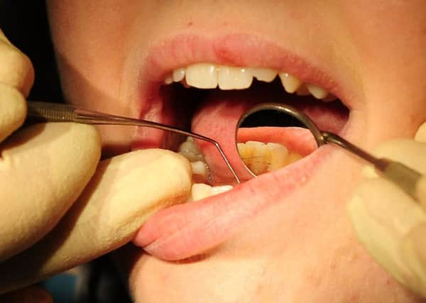Professional dentists are the only people legally allowed to perform teeth whitening at a business premise.
Picture: Rui Vieira/PA Wire