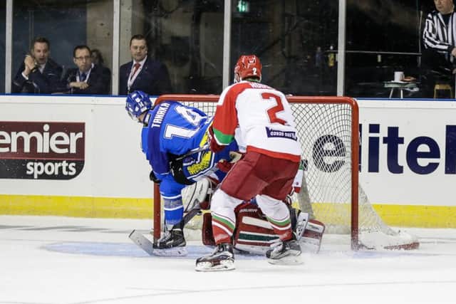 Cale Tanaka forces home the puck to make it 3-0 to Coventry Blazae against Cardiff Devils. Picture: Scott Wiggins.