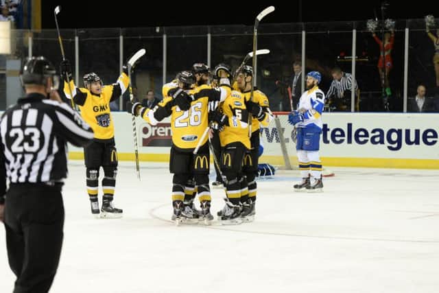 Nottingham celebrate one of their second period strikes against Fife Flyers. Picture: Karl Denham.