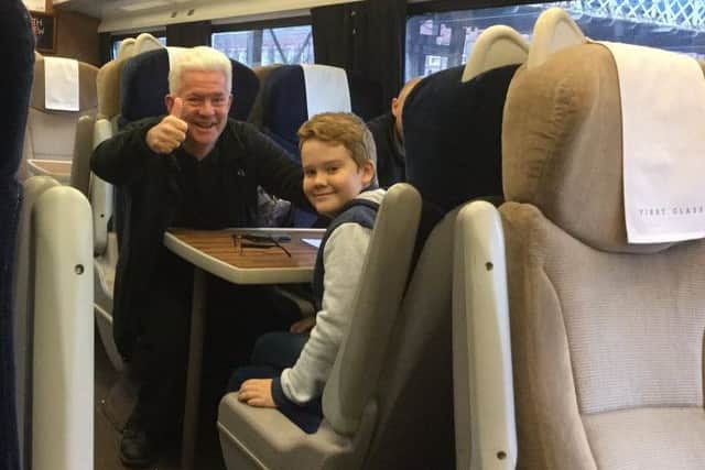 Ian McMillan pictured on a London-bound train by Barnsley East MP Michael Dugher and posted on his Twitter page.