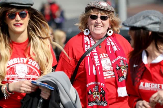 Barnsley fans on Wembley Way before the Johnstone's Paint Trophy final at Wembley Stadium, London. PRESS ASSOCIATION Photo. Picture date: Sunday April 3, 2016. See PA story SOCCER Final. Photo credit should read: Adam Davy/PA Wire. RESTRICTIONS: EDITORIAL USE ONLY No use with unauthorised audio, video, data, fixture lists, club/league logos or "live" services. Online in-match use limited to 75 images, no video emulation. No use in betting, games or single club/league/player publications.