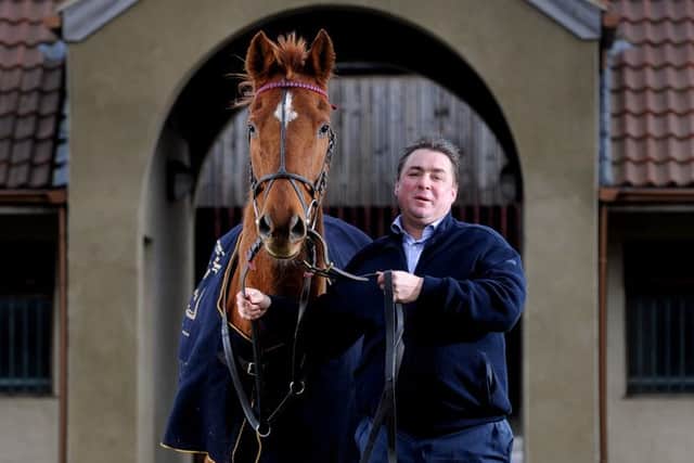 Richard Guest,  with former 2001 Grand National Winner Red Marauder at Ingmanthorpe Racing Stables Limited, Ingmanthorpe Grange Farm.