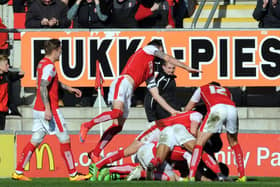 Rotherham United players celebrate Greg Halford's late penalty winner against Leeds United (Picture: Tony Johnson).