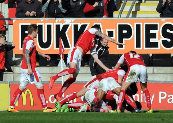 Rotherham United players celebrate Greg Halford's late penalty winner against Leeds United (Picture: Tony Johnson).