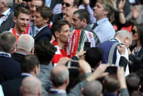 Reds captain Connor Hourihane with the trophy. (Picture: Tony Johnson)