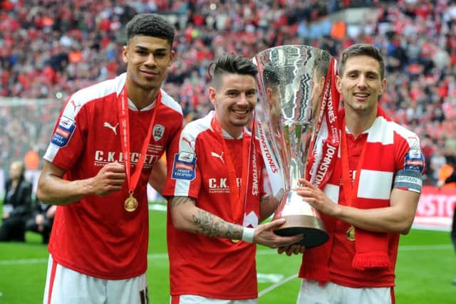 Barnsley have won the JP Trophy - from left, Ashley Fletcher, Adam Hammill and captain Conor Hourihane