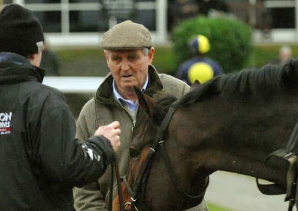 Harvey Smith with Mister McGoldrick, who was a course specialist at Wetherby.