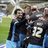 Sheffield Wednesday's players celebrate Fernando Forestieri's winner at Huddersfield Town. Picture: Steve Ellis.