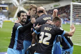 Sheffield Wednesday's players celebrate Fernando Forestieri's winner at Huddersfield Town. Picture: Steve Ellis.