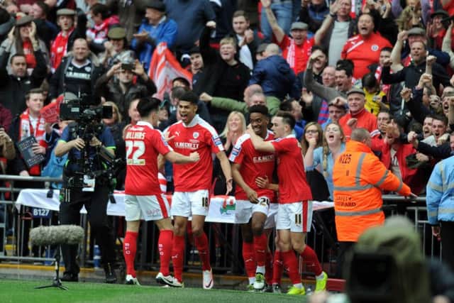 MAGIC MEMORIES: Barnsley's players celebrate Ashley Fletcher's goal against Oxford in the JPT Final at Wembley. Picture: Tony Johnson