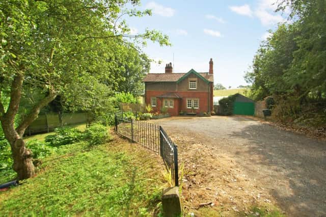 West Heslerton village is for sale at 20m, including its 21-bedroom mansion, 43 houses, a pub, a range of other buildings and more than 2,000 acres of farmland.